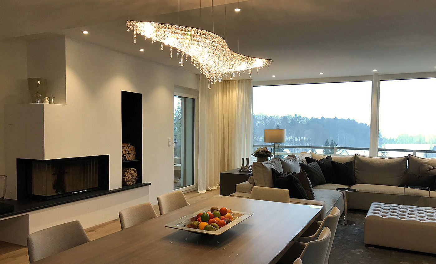 switzerland-manooi-vague-luxury-apartment-dining-room-martinuzzi Vague luxury chandelier from Manooi in a living room in Switzerland.